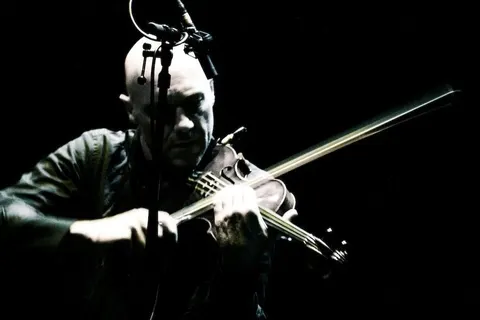 Michael Nick performing on violin